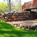 re-landscaping-st-croix-falls-wi-stone-retaining-wall
